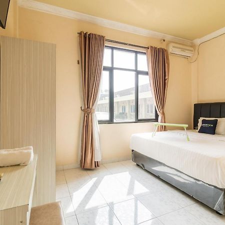 Urbanview Hotel Nugraha Palembang By Reddoorz Экстерьер фото